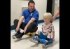 Five Counties Children's Centre CEO Scott Pepin races client Hamish down the hall after he completed one of his recent treatment sessions at the Peterborough-based children's treatment centre. (Photo courtesy of Five Counties Children's Centre)