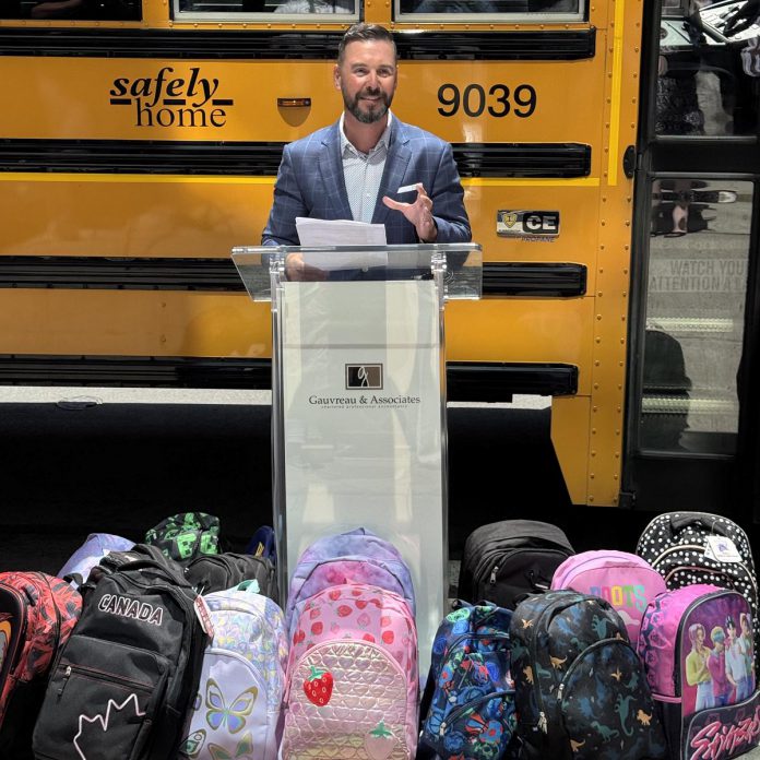 Gauvreau Accounting Tax Law Advisory founder and CEO Robert Gauvreau announced the fifth annual "Gear Up for Good" campaign outside the firm's King Street office in downtown Peterborough on July 23, 2026. This year's campaign aims to prepare 300 fully stocked backpacks for children heading back to school this fall including, for the first time, 100 backpacks for children in Manitoba, where Gauvreau has two offices. (Photo courtesy of Gauvreau Accounting Tax Law Advisory)