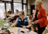 Attendees at Green Economy Peterborough's fifth annual Leadership in Sustainability Celebration on June 11, 2026 collaborate on a visioning exercise where they shared ideas on what a healthy, sustainable version of Peterborough and the Kawarthas in 2050 means to them. Responses included vibrant neighbourhoods, thriving local businesses and a resilient low-carbon economy. (Photo: Heather Doughty)