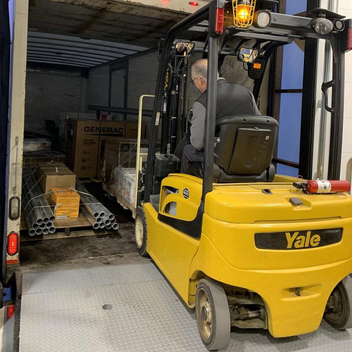 As one of several green initiatives, KADEX Aero Supply at the Peterborough Airport switched to an electric forklift to reduce emissions. As a result of its recent warehouse renovation and expansion, the company has also doubled insulation ratings and installed high-efficiency LED lighting and heating systems. (Photo courtesy of KADEX Aero Supply)