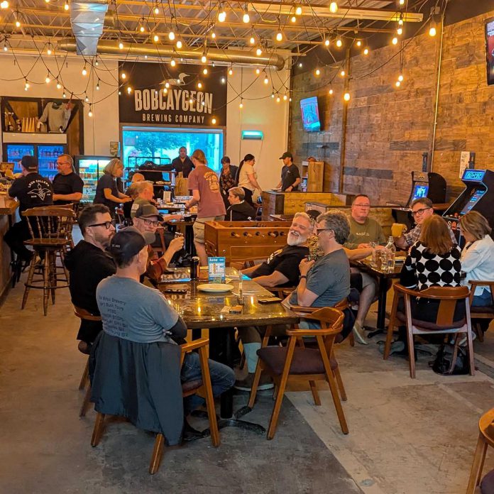Since fall 2025, Bobcaygeon Brewing Company's taproom in Peterborough has been undergoing a facelift that has made it more welcoming with the taproom now offering foosball, pool tables, four TVs to screen sports, and other activities. The brewery also serves alcohol-free and low-alcohol beers. (Photo courtesy of Bobcaygeon Brewing Company)