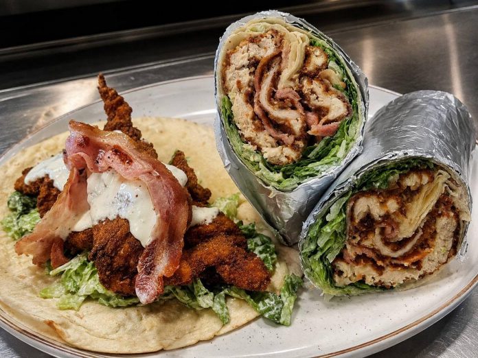You never know what you'll find on the menu at Two Fat Greeks, a roadside eatery near Lakefield that feels more like a restaurant. The menu features Greek favourites including souvlaki, pita, and gyro alongside burgers, poutines, hotdogs, desserts, and rotating daily additions. (Photo courtesy of Two Fat Greeks)