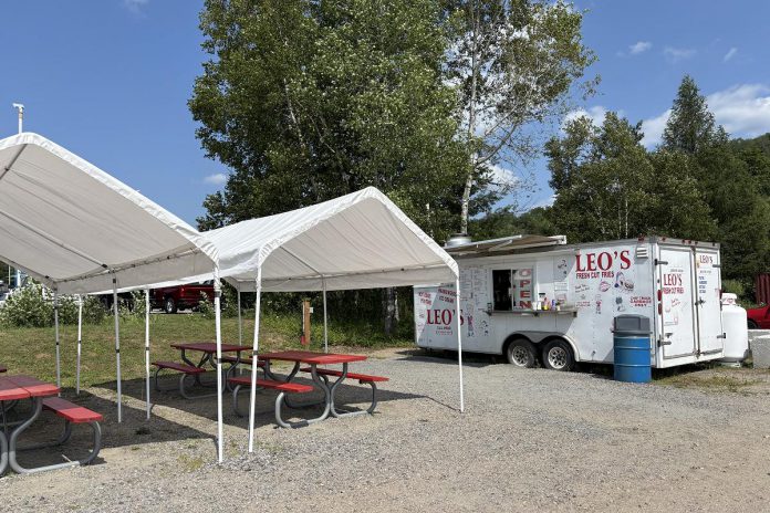 Located in Bird's Creek north of Bancroft, Leo's Food Truck had already built a reputation when owner Craig Cannon took over the business 23 years ago. Now known for serving sizable portions that won't break the bank, the food truck serves comfort food favourites including burgers, poutines, hot dogs, chicken fingers, fish and chips, and sausage. (Photo: Megan Gallant / kawarthaNOW)