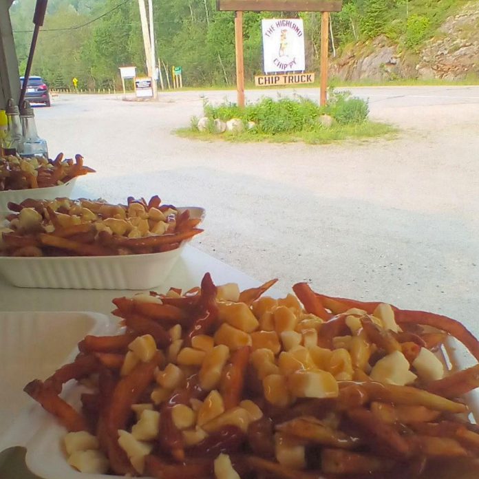 The Highland Chip'py' in Haliburton County is owned by Mac Burroughs, who started the business when he was 14 years old. In addition to typical chip truck fare like poutine, The Highland Chip'py' serves grilled cheese, ice cream, and a signature burger topped with peanut butter and bacon. (Photo courtesy of The Highland Chip'py')