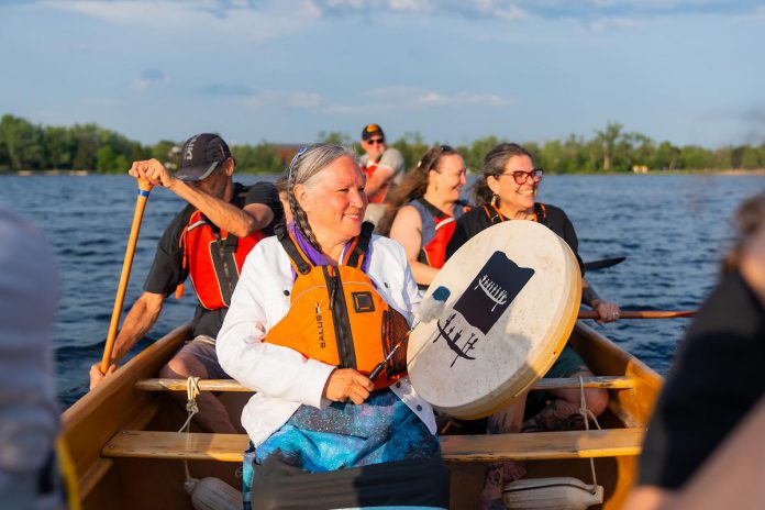 Returning for its second year on July 19, 2026, Peterborough Musicfest's "Woven Stories: A Night of Indigenous Music, Culture and Celebration" will begin at 6:45 p.m. with a traditional canoe arrival featuring the Curve Lake First Nation Women's Hand Drum Group, led by Janet McCue. (Photo: Conor Murphy)
