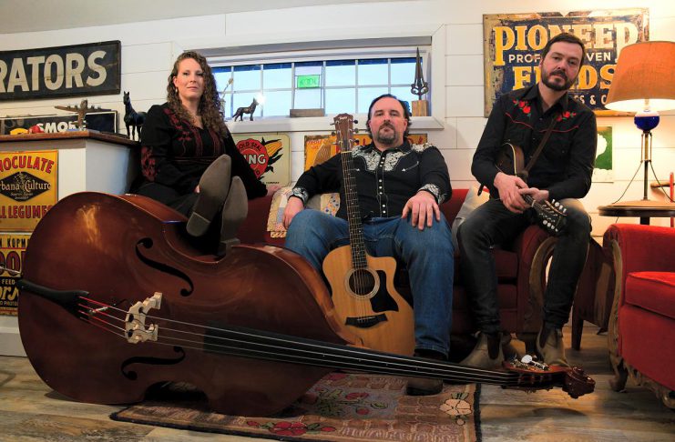 nightlifeNOW – July 2 to 8 Southwestern Ontario folk/roots trio Cabin Fever (Jessica McKay on upright bass and vocals, Kyle Faulkner on guitar and vocals, and Colin Jolly on mandolin) perform their blend of Canadian Americana, folk, and bluegrass music with captivating storytelling at the Dominion Hotel in Minden on Saturday night. (Photo: Will Ronholm Photography)