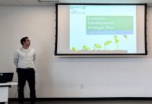 Kevin McPhillips of McSweeney & Associates, the consulting firm retained by the City of Peterborough to facilitiate the creation of the city's new five-year economic development strategic plan, waits to make a presentation during a community open house at Miskin Law Community Complex on July 20, 2026. (Photo: Bethan Bates / kawarthaNOW)