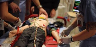 Staff of the Emergency Department at Peterborough Regional Health Centre (PRHC) undergo simulation training to prepare for real-life emergency scenarios using a pediatric mannequin. The PRHC Foundation has made it a priority to support the simulation training program by investing in a state-of-the-art adult mannequin with the help of donors. One of many areas of urgent care being supported through PRHC's $70 million Campaign for PRHC, the new simulation mannequin will better mimic human patients to improve learning outcomes, communication, and collaboration across teams during real-life emergencies. (Photo courtesy of PRHC Foundation)
