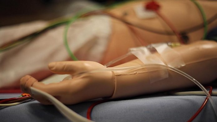 Unlike the pediatric simulation mannequin pictured here at the Emergency Department of Peterborough Regional Health Centre (PRHC), where training participants have to tape intravenous tubes to the mannequin, a state-of-the-art mannequin can take injections into veins, bones, or muscles. It also has four removable limbs to simulate traumatic accidents and gunshot wounds and is able to simulate a cricothyrotomy situation, where healthcare professionals have to access an airway through the front of the neck. (Photo courtesy of PRHC Foundation)