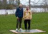The Amazing Race Canada host Jon Montgomery with former Curve Lake First Nation chief and Order of Canada member Keith Knott at the pit stop for the fifth episode of season 12 of the reality TV series. The episode, which features locations across Peterborough and the Kawarthas including The Canadian Canoe Museum and the Ontario Turtle Conservation Centre in Peterborough, Kawartha Dairy in Bobcaygeon, and Lock 31 of the Trent-Severn Waterway in Buckhorn, airs on CTV on August 11, 2026 and streams on Crave the following day. (Photo: Bell Media)
