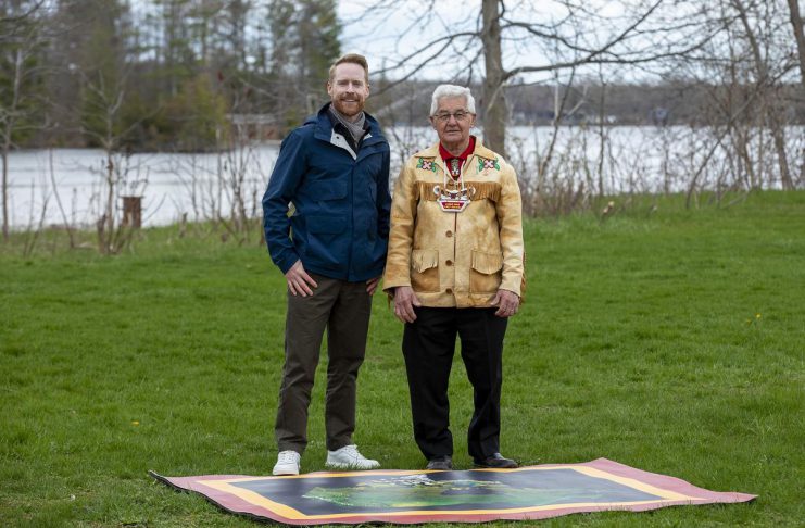 Peterborough and the Kawarthas profiled in episode of The Amazing Race Canada The Amazing Race Canada host Jon Montgomery with former Curve Lake First Nation chief and Order of Canada member Keith Knott at the pit stop for the fifth episode of season 12 of the reality TV series. The episode, which features locations across Peterborough and the Kawarthas including The Canadian Canoe Museum in Peterborough, the Ontario Turtle Conservation Centre in Peterborough County, Kawartha Dairy in Bobcaygeon, and Lock 31 of the Trent-Severn Waterway in Buckhorn, airs on CTV on August 11, 2026 and streams on Crave the following day. (Photo: Bell Media)