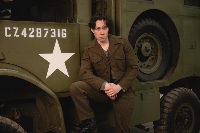 Aaron Macpherson stars as a young Farley Mowat in "And No Birds Sang", Dave Carley's adaptation of the late Canadian author and environmentalist's memoir of the same name, in which he recounts his experiences in the Second World War. The play premieres at the Capitol Theatre's Sculthorpe Theatre in Port Hope, running for 27 performances from August 14 to September 6, 2026. (Photo: Sam Moffatt) Aaron Macpherson stars as a young Farley Mowat in "And No Birds Sang", Dave Carley's adaptation of the late Canadian author and environmentalist's memoir of the same name, in which he recounts his experiences in the Second World War. The play premieres at the Capitol Theatre's Sculthorpe Theatre in Port Hope, running for 27 performances from August 14 to September 6, 2026. (Photo: Sam Moffatt)