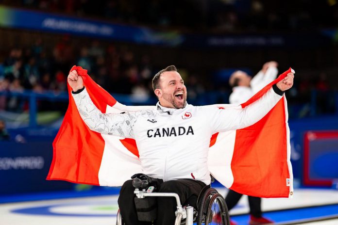 Jon Thurston, a native of Dunsford in Kawartha Lakes, celebrating Team Canada's gold medal win over Team China at the mixed team wheelchair curling competition at the Milano Cortina Paralympic Games on March 14, 2026. (Photo: World Curling) Jon Thurston, a native of Dunsford in Kawartha Lakes, celebrating Team Canada's gold medal win over Team China at the mixed team wheelchair curling competition at the Milano Cortina Paralympic Games on March 14, 2026. (Photo: World Curling)