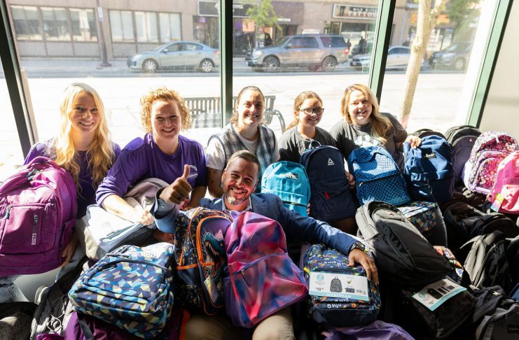 Gauvreau’s Gear Up for Good campaign delivers 310 backpacks to children in Peterborough and Winnipeg Gauvreau Accounting Tax Law Advisory founder and CEO Robert Gauvreau (front) celebrating the success of the fifth annual "Gear Up for Good" campaign, which resulted in 310 fully stocked backpacks for children in Peterborough and Winnipeg. Thanks to donations from local businesses and organizations, the campaign will also provide families with pizza vouchers, gift cards, and free haircuts. (Photo: Gauvreau Accounting Tax Law Advisory)