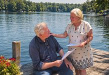 Globus Theatre founders and real-life couple James Barrett and Sarah Quick rehearsing their lines as Theo and Gwen in Kristen Da Silva's poignant romantic comedy "Beyond the Sea," which runs for 10 performances at the professional theatre company in Bobcaygeon from August 19 to 29, 2026. (Photo courtesy of Globus Theatre)