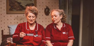 Belfast-born Melee Hutton as Francis Shields and Sarah Evans as Loretta Mackie in Shillelagh Theatre Company's February 2025 production of "Fly Me to the Moon" at the Red Sandcastle Theatre in Toronto. The two actors will reprise their roles in the Globus Theatre production of the Belfast-set dark comedy by Marie Jones, one of Northern Ireland's most internationally successful playwrights, which runs from August 5 to 15, 2026 in Bobcaygeon. (Photo: Lisa Kannako)
