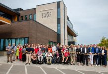 Northumberland County officials, residents, families, staff, project partners, and community representatives gathered for a grand opening ceremony of the new Golden Plough Lodge long-term care home in Cobourg on August 20, 2026. (Photo courtesy of Northumberland County)
