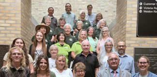 City of Kawartha Lakes honours local champions for pollinators and the environment City of Kawartha Lakes councillor Pat Warren and Mayor Doug Elmslie (front row, third and fourth from left) with the recipients of the 2025 "Bee a Hero" and "Environmental Hero" awards at Kawartha Lakes City Hall in Lindsay on August 25, 2026. (Photo: City of Kawartha Lakes)