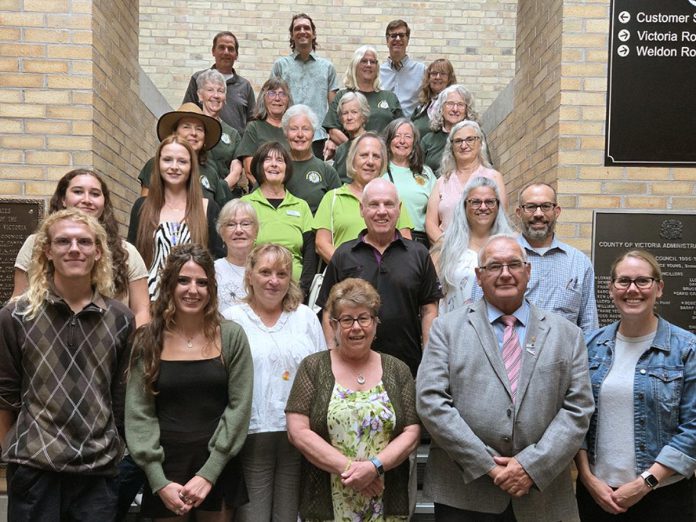 City of Kawartha Lakes councillor Pat Warren and Mayor Doug Elmslie (front row, third and fourth from left) with the recipients of the 2025 "Bee a Hero" and "Environmental Hero" awards at Kawartha Lakes City Hall in Lindsay on August 25, 2026. (Photo: City of Kawartha Lakes)
