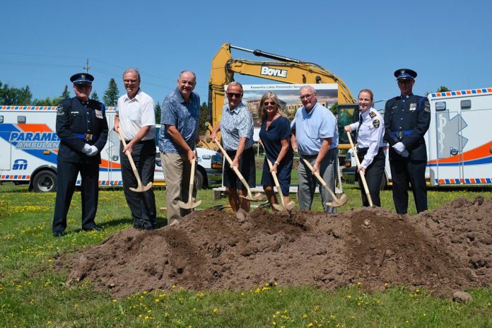 Flanked by members of the Kawartha Lakes Paramedic Service honour guard, paramedic chief Sara Johnston (second from right), Kawartha Lakes mayor Doug Elmslie (third from right) and members of Kawartha Lakes council participate in a groundbreaking ceremony at the site of the new Kawartha Lakes Paramedic Service headquarters at 230 Angeline Street South in Lindsay on August 4, 2026. (Photo: Adam Guppy)
