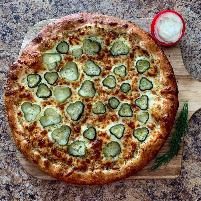 What began as a limited-time pizza at Formerly Tony's in Lindsay has turned into a signature menu item. A customer favourite, the dill pickle pizza is crafted with a ranch dressing made in-house by Lindsay business Fresh FueLL. (Photo courtesy of Formerly Tony's)