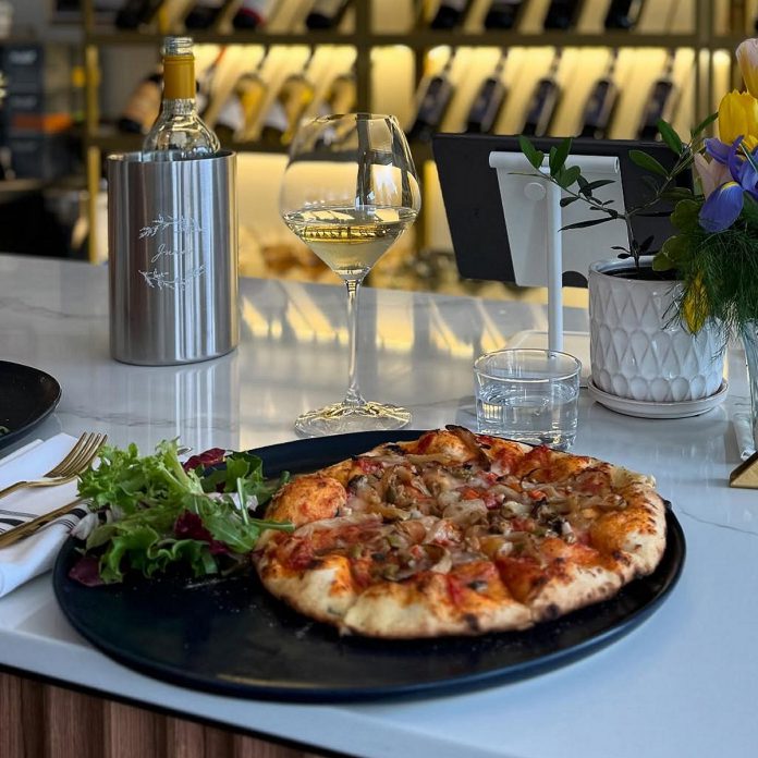 One of the newest eateries in the region quickly becoming known for serving high-quality pizza is Juna, an elevated restaurant in Haliburton. Juna makes dough from scratch using double zero flour from Italy which is then fermented for a minimum of 24 hours before being topped with house-made sauce and cheese and cured meats that have also been sourced from Italy. (Photo courtesy of Juna)