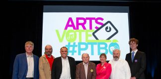 Peterborough mayoral candidates Michael Eamon, Rob Hailman, Neil Morton, Keith Riel, Rebecca Schillemat, Brian Lumsden, and Jacob Méthot on stage at Market Hall Performing Arts Centre for ArtsVote 2026, hosted by the Electric City Culture Council (EC3) on Wednesday, September 23. (Photo: Jordan Lyall / kawarthaNOW)