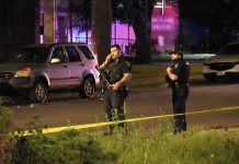 Police officers outside the Sons of Jacob Synagogue in Belleville on September 20, 2026, when an exchange of gunfire near the synagogue where worshippers had gathered for Yom Kippur sent a 29-year-old man man and a police officer to hospital. (Photo: CBC)
