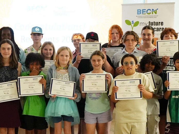 Five Counties Children's Centre client Wyatt Robertson (middle, in ball cap with red maple leaf) was among two dozen youth ages 8-14 from across Northumberland County who received micro-grants this summer through a kids' entrepreneurship program offered by Business and Entrepreneurship Centre Northumberland. (Photo courtesy of Business and Entrepreneurship Centre Northumberland)