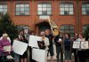 A scene from the 2019 documentary "Town of Widows" by Natasha Luckhardt and Rob Viscardis, which documents the fight for justice by former GE workers and their widows in Peterborough who believe workplace exposure to toxic substances caused illnesses and cancer deaths. The documentary will be screened during "Good Neighbours Deserve Answers," a free community forum at the Peterborough Public Library on October 18, 2026 that seeks answers from GE Vernova and Ontario's Ministry of the Environment, Conservation and Parks about the plan to demolish most of the contiminated buildings at the factory complex in downtown Peterborough. (Photo: Rob Viscardis)