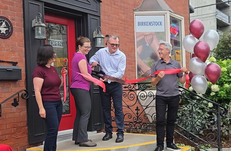 Grady’s Feet Essentials in downtown Peterborough begins new chapter under new owners New owners Theresa Thibadeau and Mark Walsh cut the ribbon at the entrance to Grady's Feet Essentials at 231 King Street in downtown Peterborough as retiring owners Kelli and Tony Grady look on during a ceremony on September 1, 2026. (Photo courtesy of Grady's Feet Essentials)