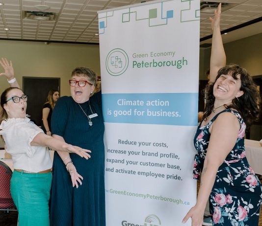 "Climate action is good for business." Peterborough and Kawarthas Chamber of Commerce president and CEO Brenda Whitehead (middle) with Peterborough County economic development manager Rhonda Keenan (left) and Jigsaw Organizing Solutions founder and Women's Business Network of Peterborough treasurer Adeilah Dahlke (right) celebrating sustainable leaders in the community at an event hosted by Green Economy Peterborough in June 2026. (Photo: Heather Doughty)