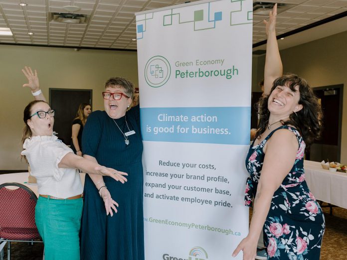 "Climate action is good for business." Peterborough and Kawarthas Chamber of Commerce president and CEO Brenda Whitehead (middle) with Peterborough County economic development manager Rhonda Keenan (left) and Jigsaw Organizing Solutions founder and Women's Business Network of Peterborough treasurer Adeilah Dahlke (right) celebrating sustainable leaders in the community at an event hosted by Green Economy Peterborough in June 2026. (Photo: Heather Doughty) "Climate action is good for business." Peterborough and Kawarthas Chamber of Commerce president and CEO Brenda Whitehead (middle) with Peterborough County economic development manager Rhonda Keenan (left) and Jigsaw Organizing Solutions founder and Women's Business Network of Peterborough treasurer Adeilah Dahlke (right) celebrating sustainable leaders in the community at an event hosted by Green Economy Peterborough in June 2026. (Photo: Heather Doughty)