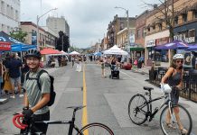 Downtown Peterborough's Second Saturday Sidewalk Sale on August 8, 2026 allowed people to experience Charlotte Street free of car traffic. Many Canadian cities are starting to reimagine their streets as places for pedestrians, not just cars. (Photo: Brett Throop / GreenUP)