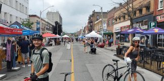 Downtown Peterborough's Second Saturday Sidewalk Sale on August 8, 2026 allowed people to experience Charlotte Street free of car traffic. Many Canadian cities are starting to reimagine their streets as places for pedestrians, not just cars. (Photo: Brett Throop / GreenUP)