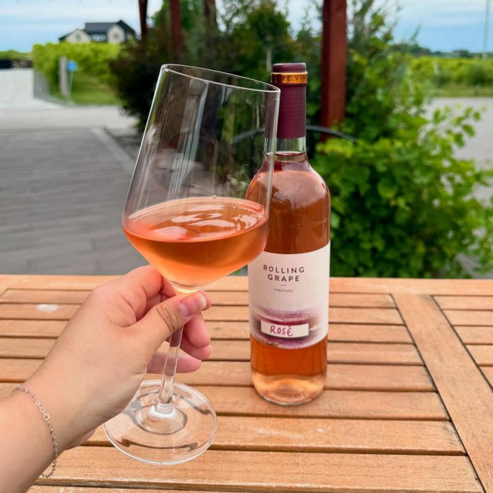 The Rosé is one of the newest wines crafted by Rolling Grape Vineyard, a boutique winery and restaurant offering a grape-to-glass experience in Bailieboro. Twelve acres of vineyard are visible from the patio, where guests are invited to try flights and tastings of the wines made on site. Rolling Grape Vineyard often partners with local makers to host yoga classes, live music, sip and shop markets, and other special events. (Photo courtesy of Rolling Grape Vineyard)