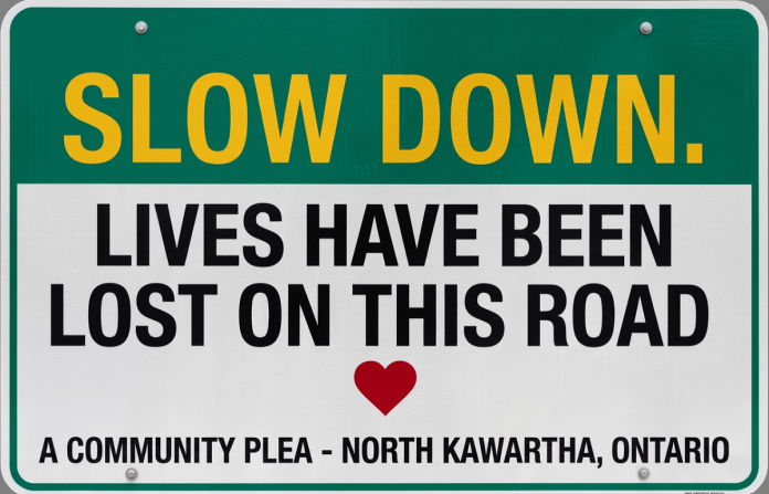 A sign designed and distributed by Christine Robson, a resident who lives along Northeys Bay Road in North Kawartha Township. Robson has been vocal about asking drivers to slow down on the roadway after two serious motorcycle collisions this summer. Peterborough County says signs and roadside memorials are allowed on private property as long as they do not include inappropriate language and do not pose a danger to drivers. (Photo: Christine Robson)