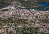 An aerial view of a portion of downtown Peterborough in 2012, looking east across the Hunter Street bridge to East City. Since this photo was taken, several multi-storey residential developments have been built in East City where, in 2025, city council also approved the construction of a new 17-storey high-rise. (Photo: City of Peterborough)