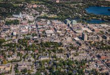 An aerial view of a portion of downtown Peterborough in 2012, looking east across the Hunter Street bridge to East City. Since this photo was taken, several multi-storey residential developments have been built in East City where, in 2025, city council also approved the construction of a new 17-storey high-rise. (Photo: City of Peterborough)
