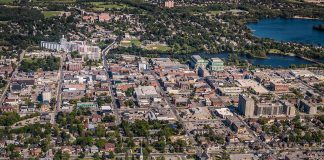 An aerial view of a portion of downtown Peterborough in 2012, looking east across the Hunter Street bridge to East City. Since this photo was taken, several multi-storey residential developments have been built in East City where, in 2025, city council also approved the construction of a new 17-storey high-rise. (Photo: City of Peterborough)