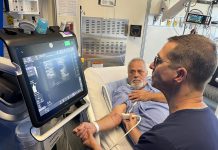 Dr. Michel Boivin uses ultrasound to care for patients in the ICU of Ross Memorial Hospital in Lindsay. (Photo: Ross Memorial Hospital Foundation)