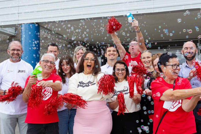 United Way Peterborough & District 2026-27 campaign chair Tiffany Arcari (third from left, front) leads members of the campaign cabinet during a campaign launch event at Healthy Planet Arena on September 17, 2026. (Photo: Jordan Lyall Photography)