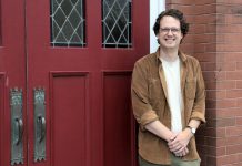 Colin McMahon has been appointed the new executive director of the Kawartha Youth Orchestra (KYO). Pictured at the KYO's home at the New Canadians Centre, McMahon has served as program manager and artistic director of Upbeat!, KYO's subsidized after-school music education program, for the past three years. (Photo: Samantha Haggstrom / KYO)