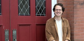 Colin McMahon has been appointed the new executive director of the Kawartha Youth Orchestra (KYO). Pictured at the KYO's home at the New Canadians Centre, McMahon has served as program manager and artistic director of Upbeat!, KYO's subsidized after-school music education program, for the past three years. (Photo: Samantha Haggstrom / KYO)
