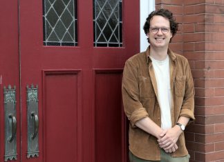 Colin McMahon has been appointed the new executive director of the Kawartha Youth Orchestra (KYO). Pictured at the KYO's home at the New Canadians Centre, McMahon has served as program manager and artistic director of Upbeat!, KYO's subsidized after-school music education program, for the past three years. (Photo: Samantha Haggstrom / KYO)