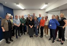 Peterborough-Kawartha MPP Dave Smith joined Community Care Peterborough staff and Senior Connector volunteers at the non-profit organization's office on October 14, 2026 to celebrate the launch of the next phase of the Senior Connector program, which trains older adult volunteers to help other seniors find trusted information, ask questions, identify next steps, and connect with local programs and services. The expansion of the pilot program is made possible with $24,500 in funding through Ontario's Seniors Community Grant Program. (Photo: Community Care Peterborough)