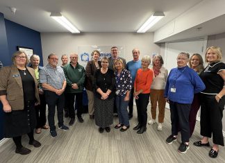 Peterborough-Kawartha MPP Dave Smith joined Community Care Peterborough staff and Senior Connector volunteers at the non-profit organization's office on October 14, 2026 to celebrate the launch of the next phase of the Senior Connector program, which trains older adult volunteers to help other seniors find trusted information, ask questions, identify next steps, and connect with local programs and services. The expansion of the pilot program is made possible with $24,500 in funding through Ontario's Seniors Community Grant Program. (Photo: Community Care Peterborough)