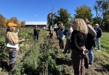 Heather Thoma, operations manager for Farms at Work, leads a plot tour at the Peterborough Community Farm in Otonabee-South Monaghan during the official launch event on October 3, 2026. (Photo courtesy of Farms at Work)