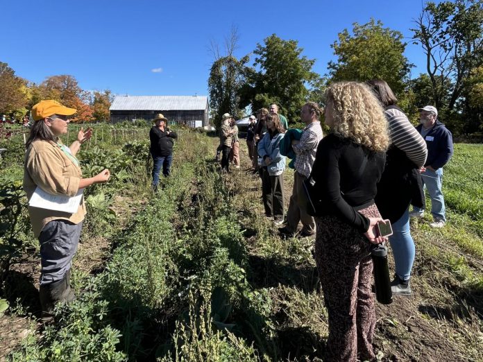 Heather Thoma, operations manager for Farms at Work, leads a plot tour at the Peterborough Community Farm in Otonabee-South Monaghan during the official launch event on October 3, 2026. (Photo courtesy of Farms at Work)
