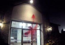 A video provided by a group claiming to be Palestine Action Canada showing red paint being splattered on the entrance to GeoSpectrum Technologies Inc. on Whittington Drive in Peterborough in the early morning hours of October 12, 2026. (kawarthaNOW screenshot)